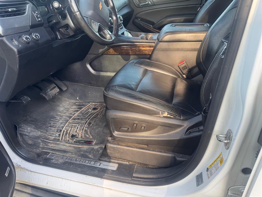 Driver's side floor and door sill before detailing, covered in dirt